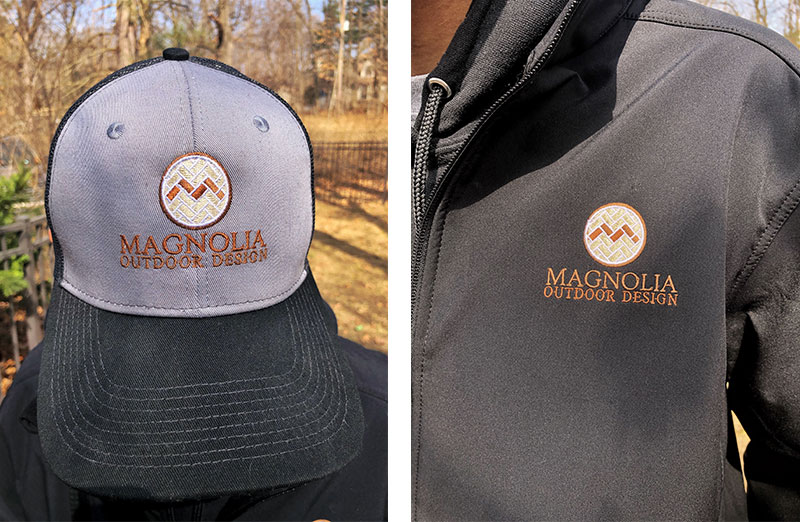owner of magnolia wearing a cap and shirt with embroidered logo